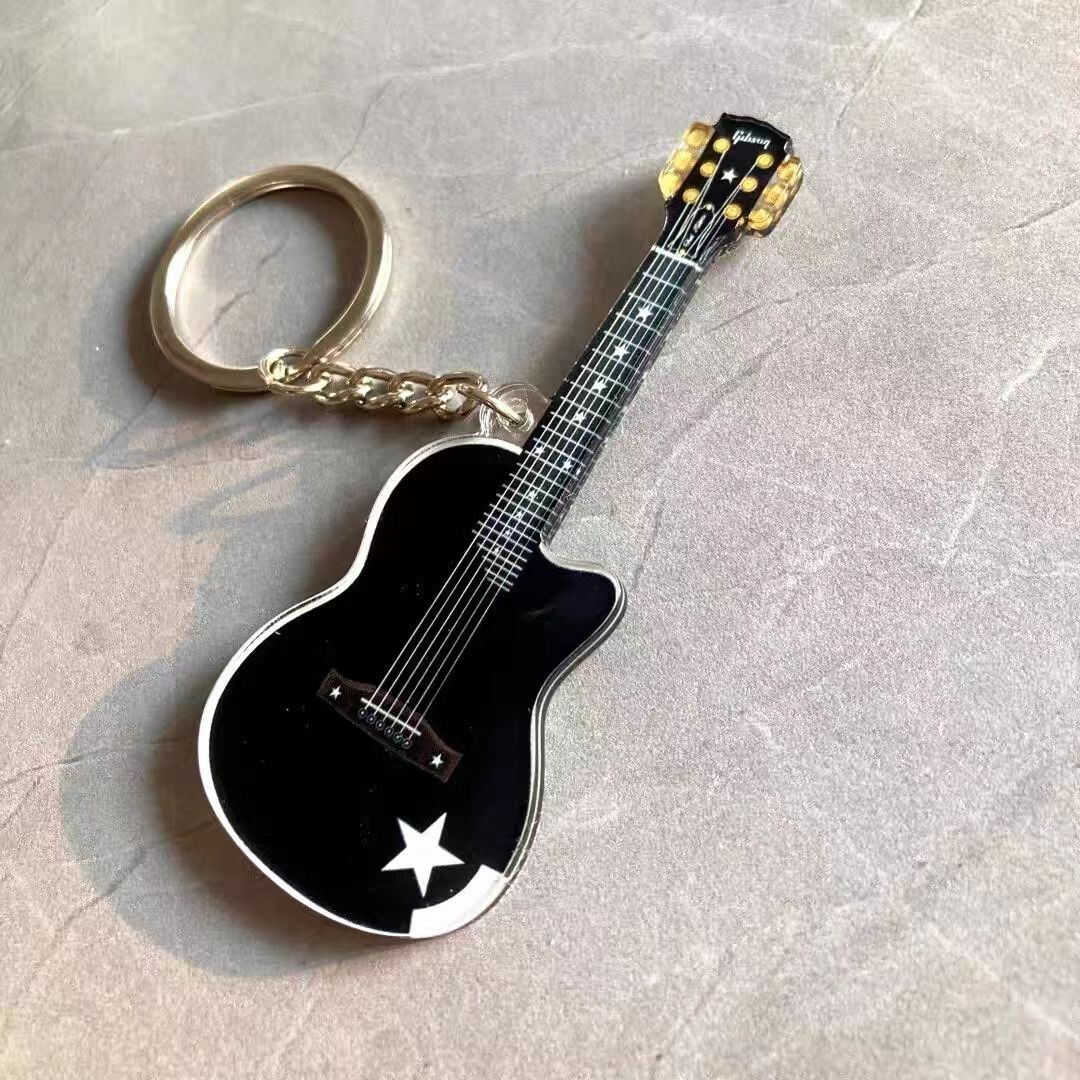 Llavero de acrílico Donghong, de alto valor estético, colgante compacto para mochila con forma de guitarra, regalo de graduación, regalo de inauguración de casa, regalo para festivales.