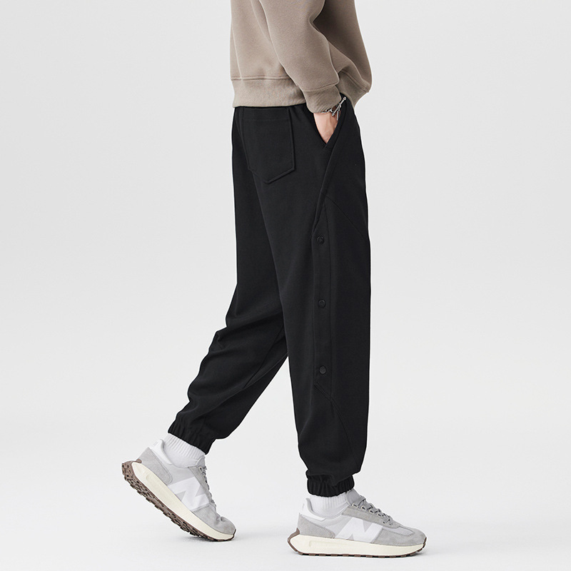 Pantalones casuales pesados negros para hombres sueltos 2025, nuevo otoño y invierno, pantalones deportivos gruesos con marca de algodón colgante
