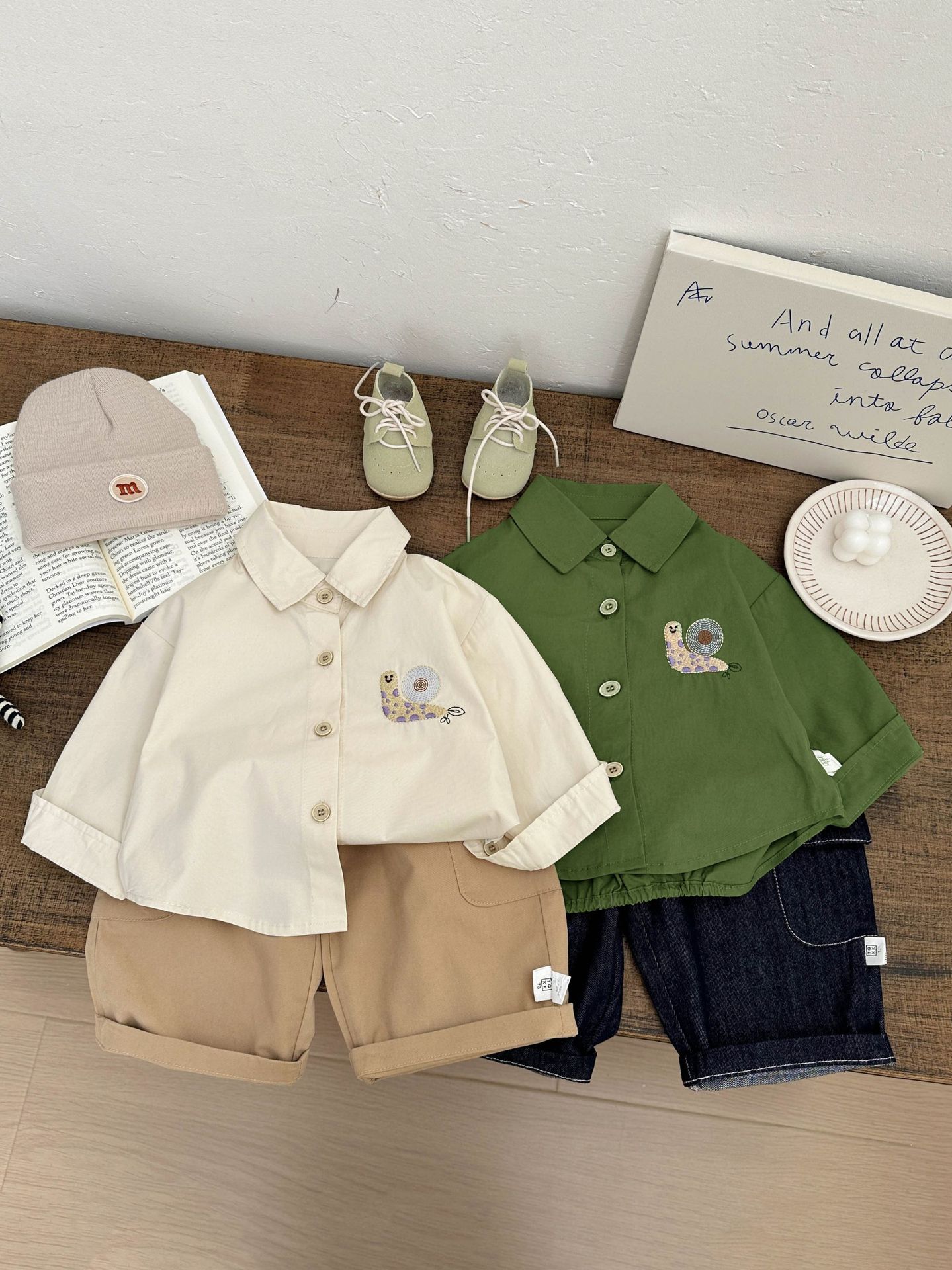 Ropa de bebé coreana 2026 nuevo bebé guapo camisa de algodón puro otoño impresión coreana de camisa de manga larga para niños