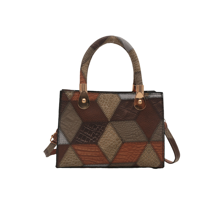 Nueva bolsa de hombro de mujer simple empalme de moda de gran capacidad bolsa de mano PU cuero suave sensación casual portátil ligero