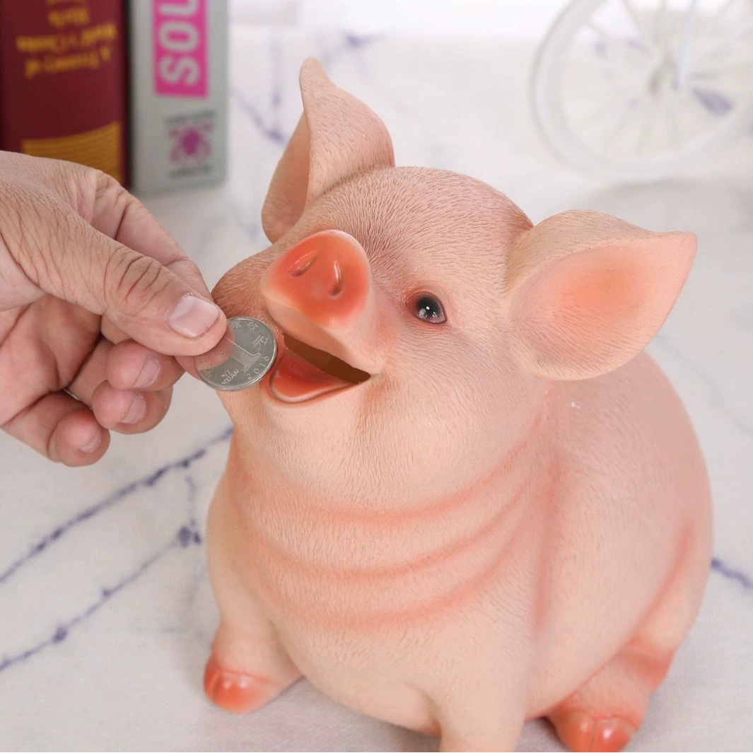 Копилка in English? Wait translate: Cartoon piggy bank -> Карикатурная/Мультяшная копилка? In Russian: Карикатурная копилка в виде поросенка? The term