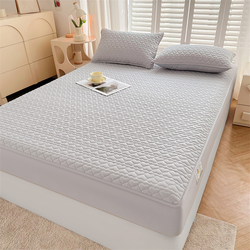 Al por mayor nueva clase A impermeable aislamiento de orina cubierta de cama acolchada engrosada Simmons colchón cubierta protectora simple color sólido colcha