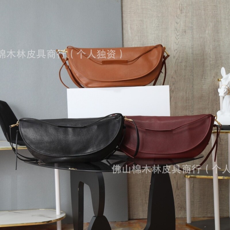 2026 All-Steel Genuine Leather Guangzhou Product Half-Moon Bag, High-End Feel Sheepskin Women's Bag, Can Be Used as Handbag, Shoulder Bag, Underarm Bag, or Crossbody Bag 2026 All-Steel Genuine Leather Guangzhou Product Half-Moon Bag, High-End Feel Sheepskin Women's Bag, Can Be Used as Handbag, Shoulder Bag, Underarm Bag, or Crossbody Bag