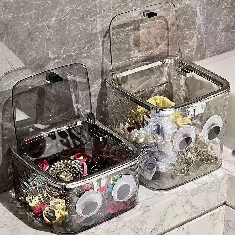 뚜껑이 있는 작은 투명 회색