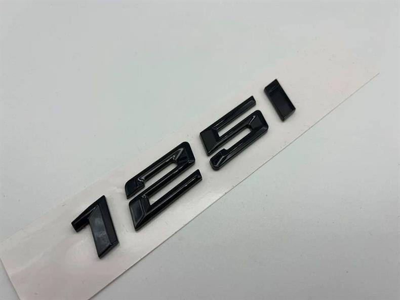 Suitable for the new BMW 116i, 118i, 120i, 125i, and 135i models; features a glossy black emblem, lettering, and tail emblem