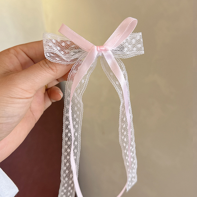 Розовая заколка для волос с бантиком