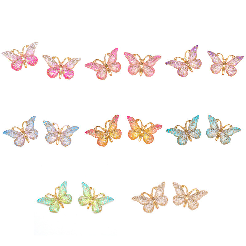 Colgante de mariposa transfronteriza de color creativo de personalidad acrílico europeo y americano bolsas de auriculares bolsas de decoración accesorios