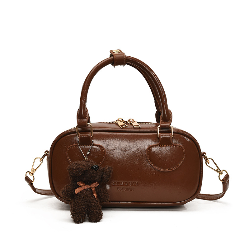 Bolsa de bolos super caliente popular de este año para mujeres 2025, nueva bolsa de hombro de tendencia universal, bolso de mano de estilo extranjero.