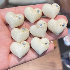 象牙の実はおならの桃の愛のdiyの部品を象眼して手で編みます。