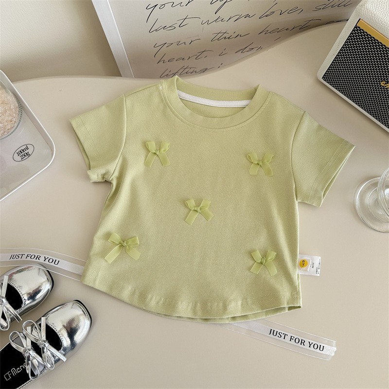 Tongxingyuan 2025 Camiseta de Verano para Niñas Estilo Coreano de Manga Corta, Camisa con Ribete de Encaje Rosa Dulce y Elegante para Bebés.