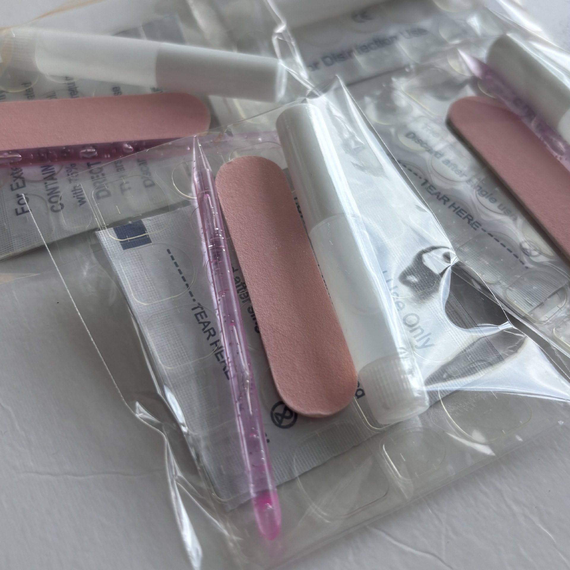 Nail art tool kit, available in sets of four or five pieces, with kraft paper and jelly glue