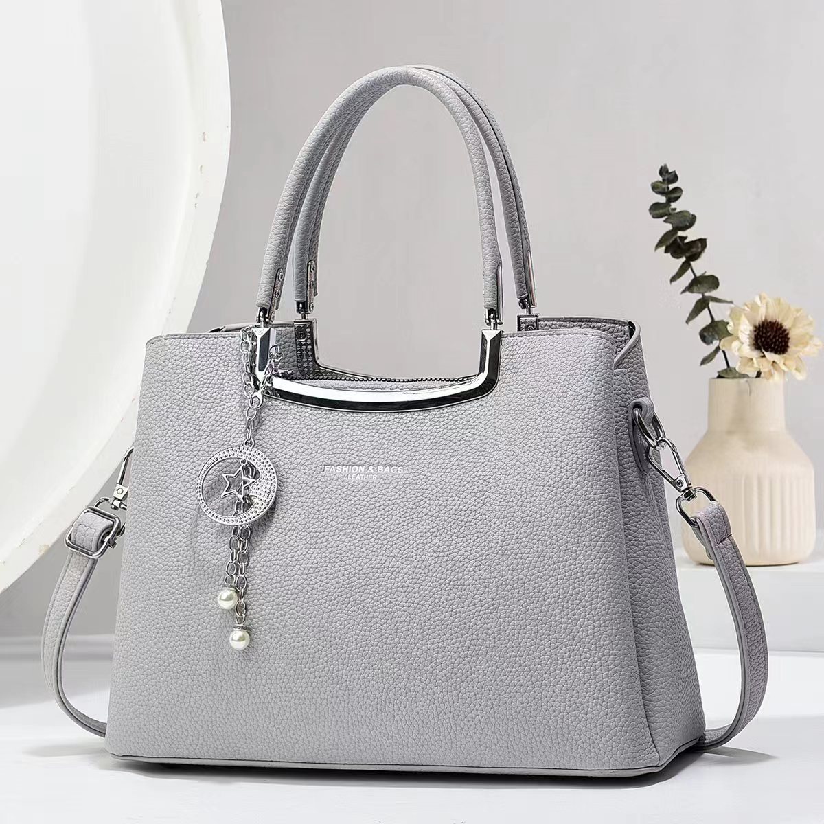 Bolso de hombro universal fabricante de alta calidad sensación de gran capacidad bolso de moda de madres de mediana edad bolso atmósfera