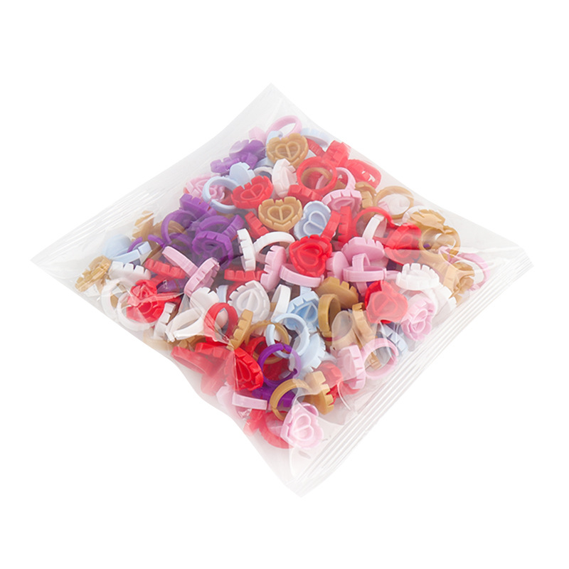 Venta al por mayor de pestañas postizas injertadas taza de anillo de goteo de pegamento 100/paquete de hermosas pestañas flor taza de anillo herramienta de bandeja de pegamento