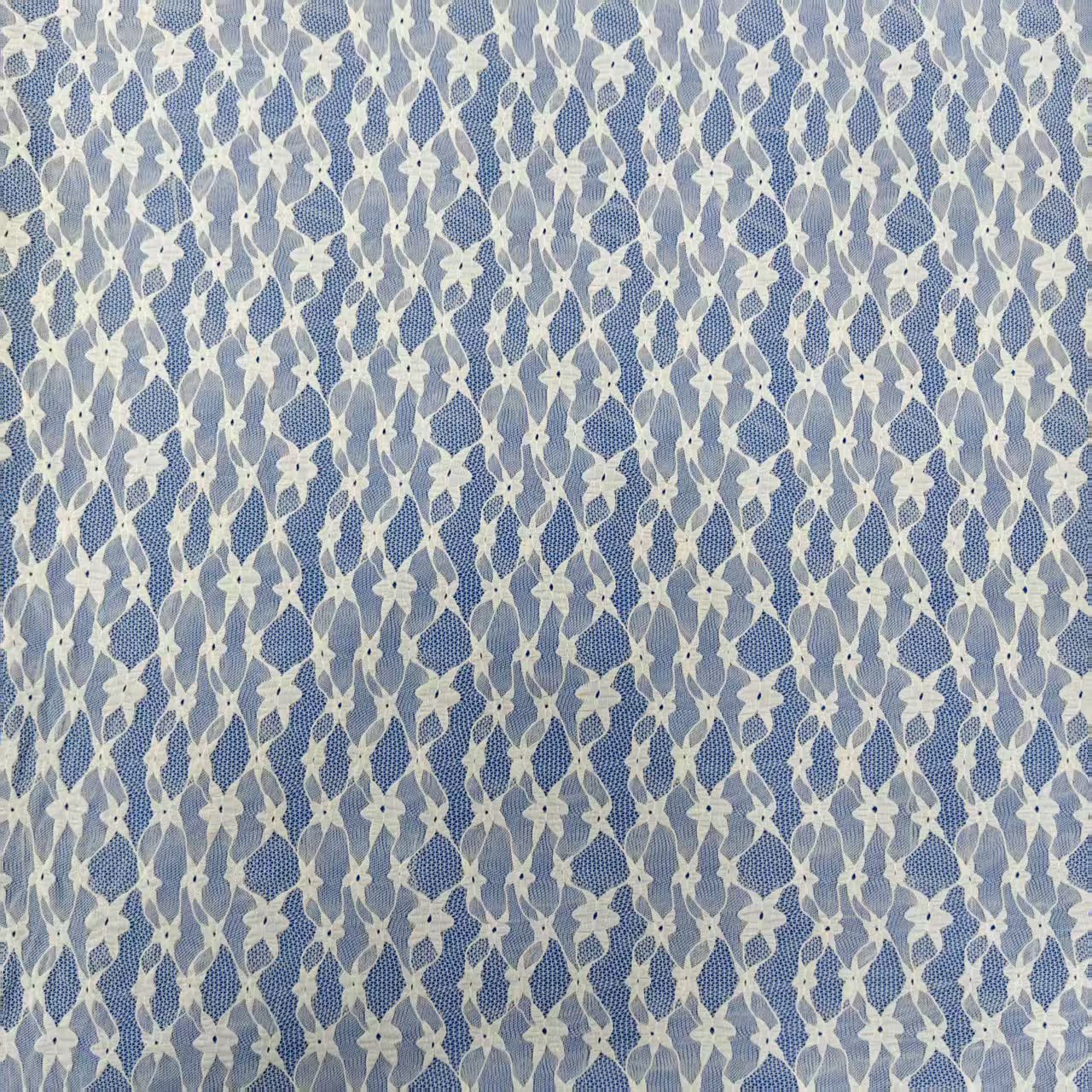 爆款薄透轻颖弹力锦氨蕾丝网布 手感软质感好童装打底裙子面料