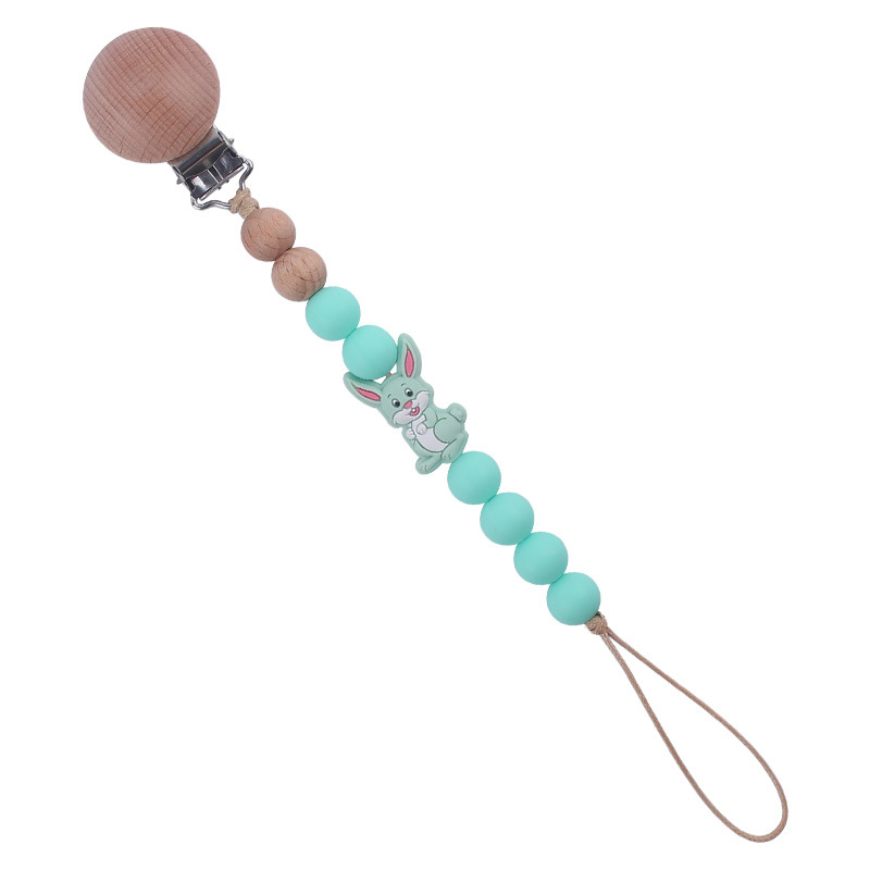 Nuevo bebé suministros dibujos animados conejo mordedor creativo lindo DIY mordedura molar pezón cadena anti-gota cuerda de la cadena