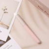 Pink round head and lip brush