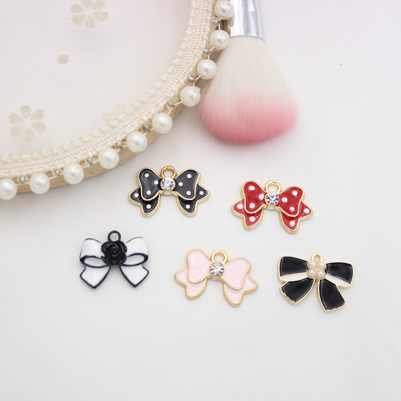 10 PCS/Package 1.5 * 20mm 14 * 14mm 7 * 12mm Alloy Rhinestones Pearl Number Heart Shape Bow Knot Polished Pendant display picture 4