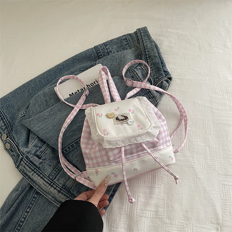 Japón dulce puro deseo mochila de encaje 2025 nueva chica coreana encantadora viaje flor pegatinas mochila pequeña