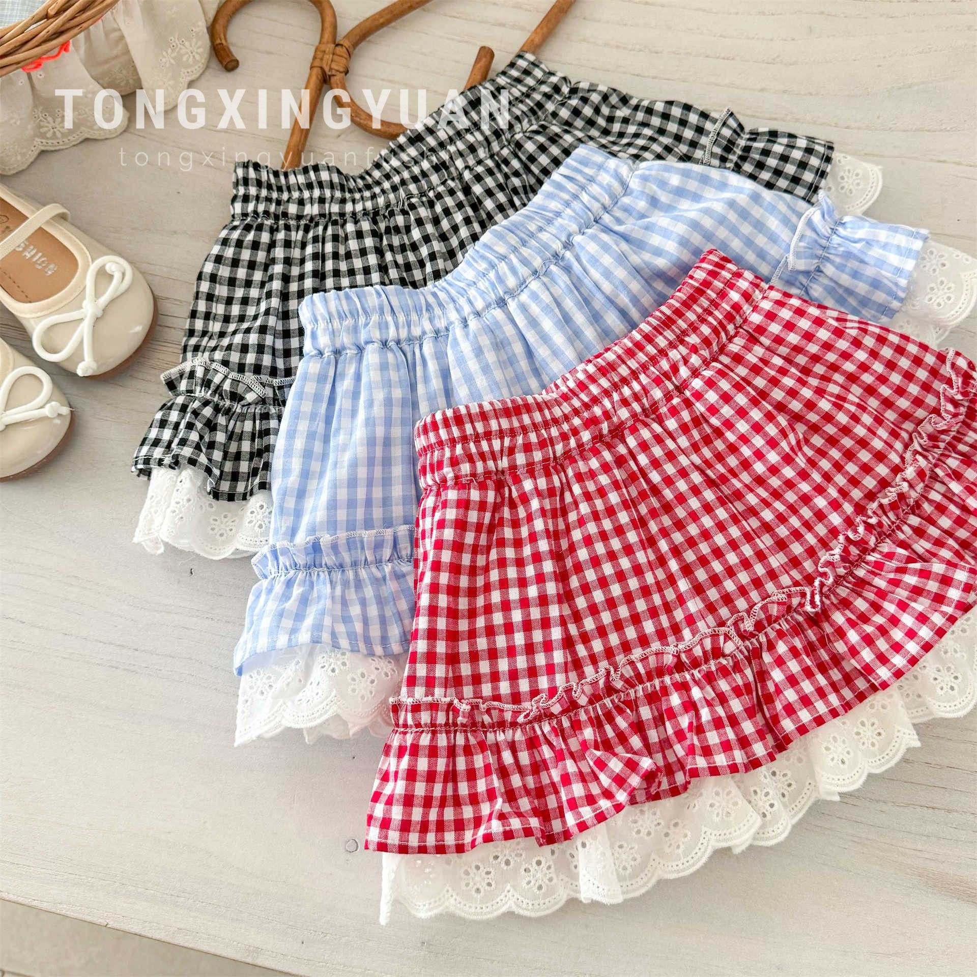 Children's Star Yuan Ropa para niños coreanos Falda corta para niñas Falda de media longitud Verano Nuevo estilo Estilo occidental Bebé Hermosa falda de pastel a cuadros