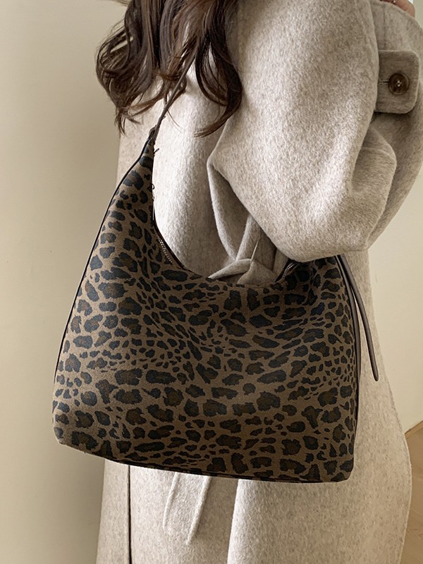 Cross-border 2025 otoño nuevo nicho de diseño brazalete texturas avanzadas retro leopardo viaje mochila de hombro