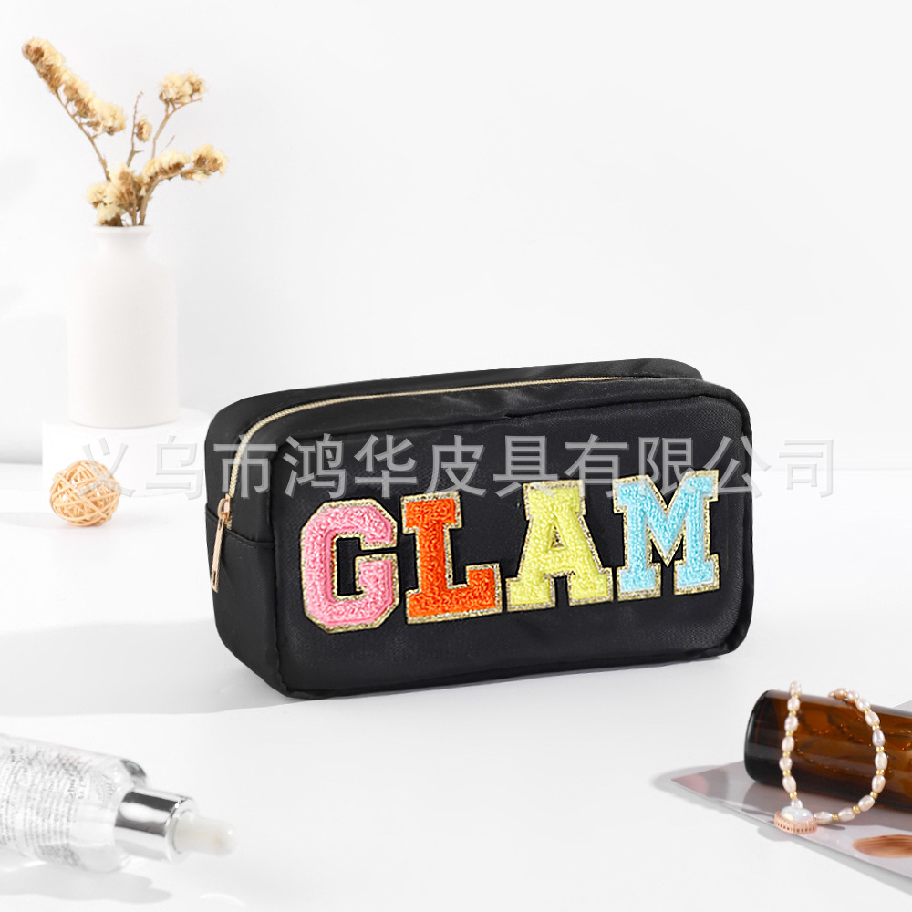 Transfronterizo amazon popular toalla bordada carta de nylon bolsa de cosméticos bolsa de almacenamiento de gran capacidad informal de las mujeres a prueba de agua