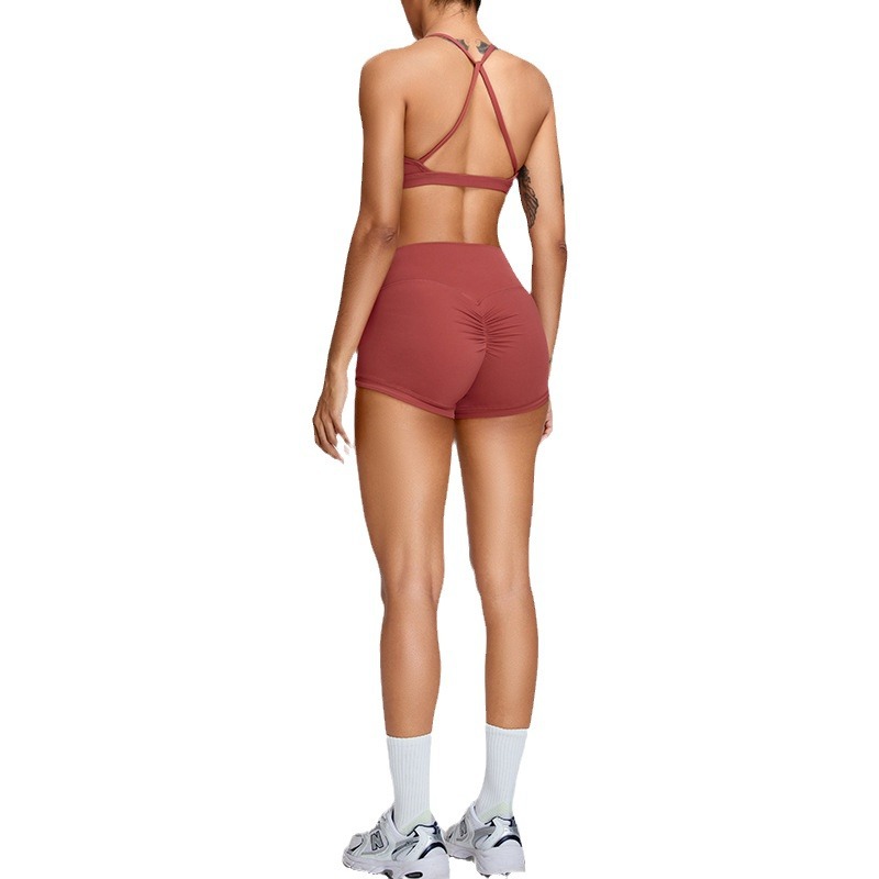 Traje de yoga desnudo apretado europeo y americano de las mujeres de secado rápido belleza espalda entrenamiento ropa al aire libre de secado rápido correr deportes pantalones cortos traje