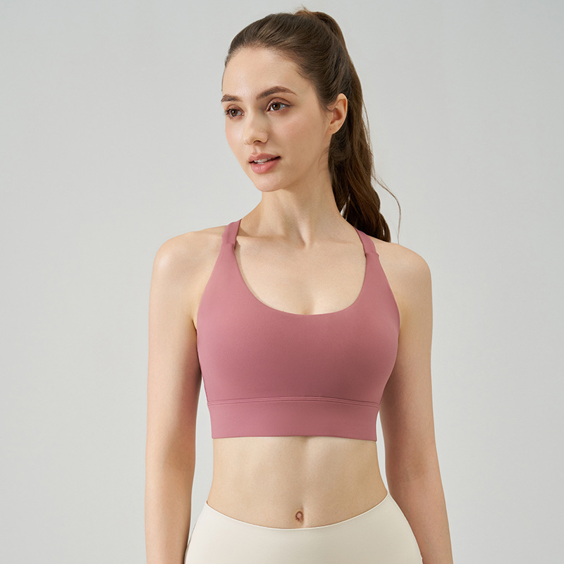 Primavera y verano nuevo estilo desnudo amortiguador sujetador deportivo mujer hueca hebilla hermosa espalda fitness yoga ropa interior correr alta intensidad