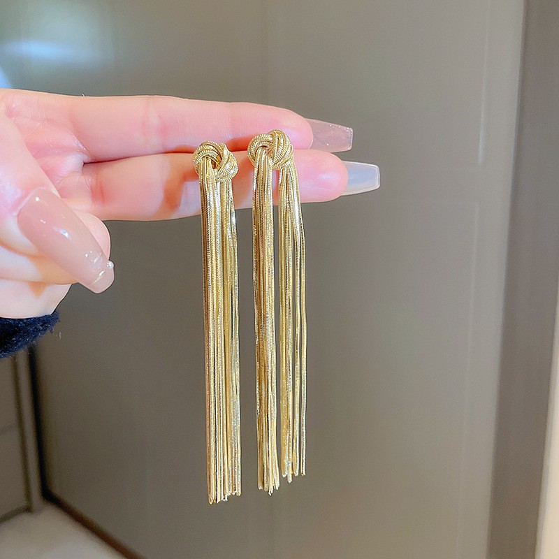 Pendientes de borla de hoja de circón largo de viento de metal con aguja de plata Pendientes de moda exquisita Pendientes de lujo ligero de viento frío