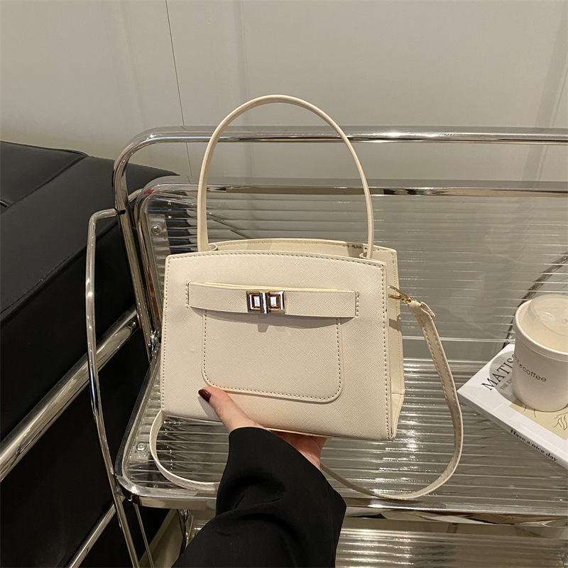 Bolso de mujer 2025 primavera nuevo bolso de mensajero de un solo hombro atmosférico de nicho simple de moda bolso de alta capacidad para mujer