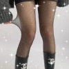 Nail sequins, black tights
