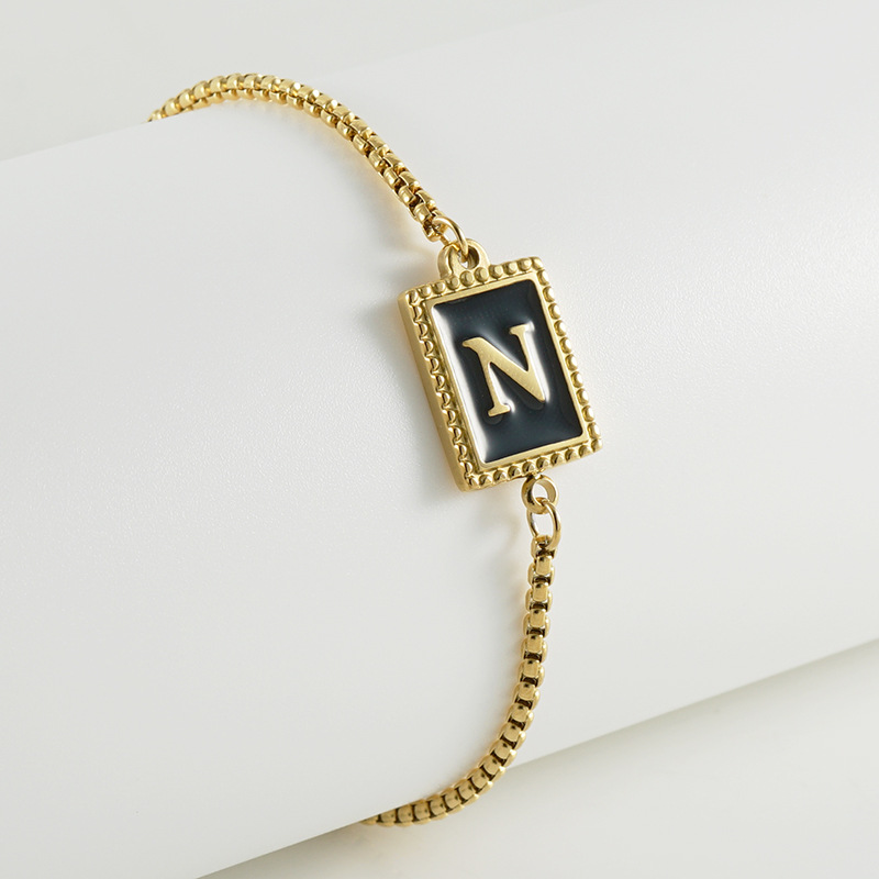 La moda europea y americana transfronteriza del acero inoxidable 26 pulsera inglesa de la letra en relieve pulsera Titanium de la cremallera del acero 18K de la frontera para las mujeres