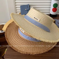 フランスの優雅なins風の麦わら帽子の女性の夏の韓系の甘い軒の日よけの帽子の海辺の休暇の日よけのビーチの帽子