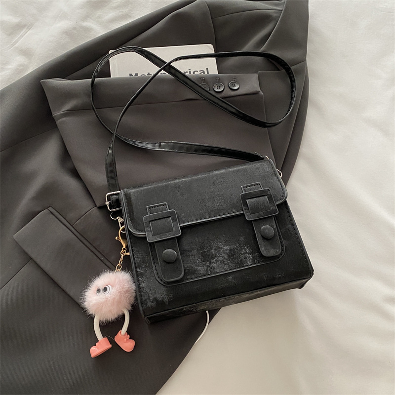 Bolso Cambridge bolso femenino 2025 nueva moda retro oso colgante bolso de hombro simple mensajero casual pequeño bolso cuadrado