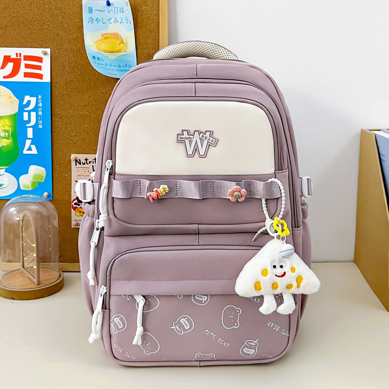 Nueva mochila de hombro simple letras negras con lindos colgantes mochila de carga mochila de gran capacidad