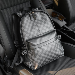 リュックサック男性の個性的なファッション男性のバッグのファッションの格子の韓国版の皮質の屋外旅行のリュックサックの学生のカバン