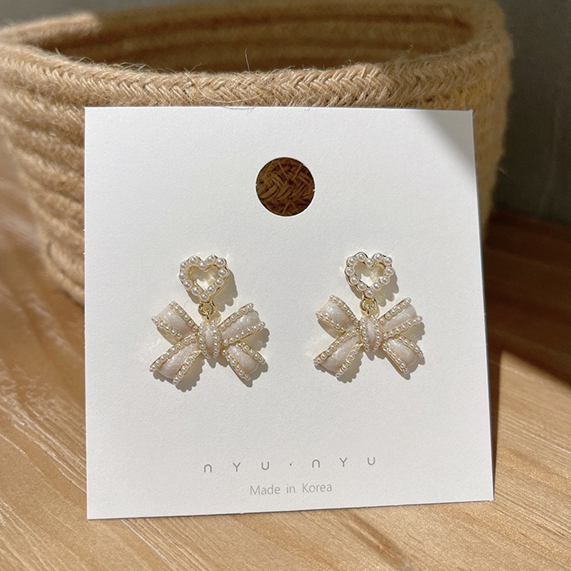 *Especiales* Pendientes coreanos de perlas con forma de corazón para mujer, diseño exclusivo, estilo de lujo ligero, pendientes de alta gama, venta al por mayor.