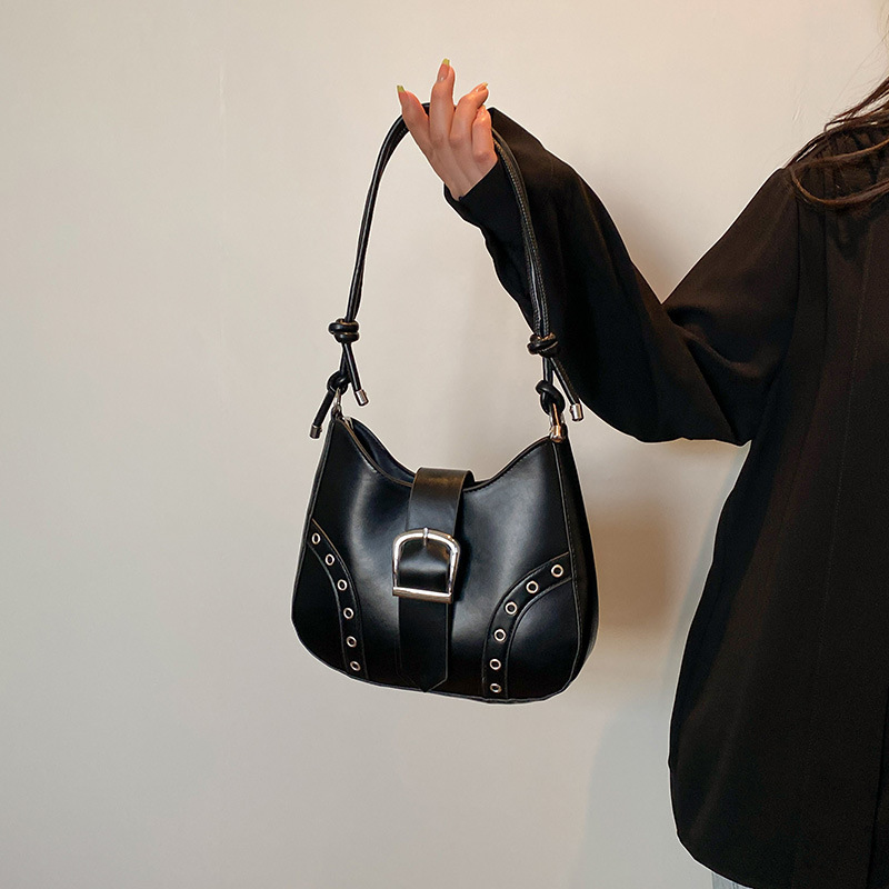 2025 nuevo bolso de verano bolso de axila mujer remache de alta gama moda de nicho bolso de hombro de todo fósforo