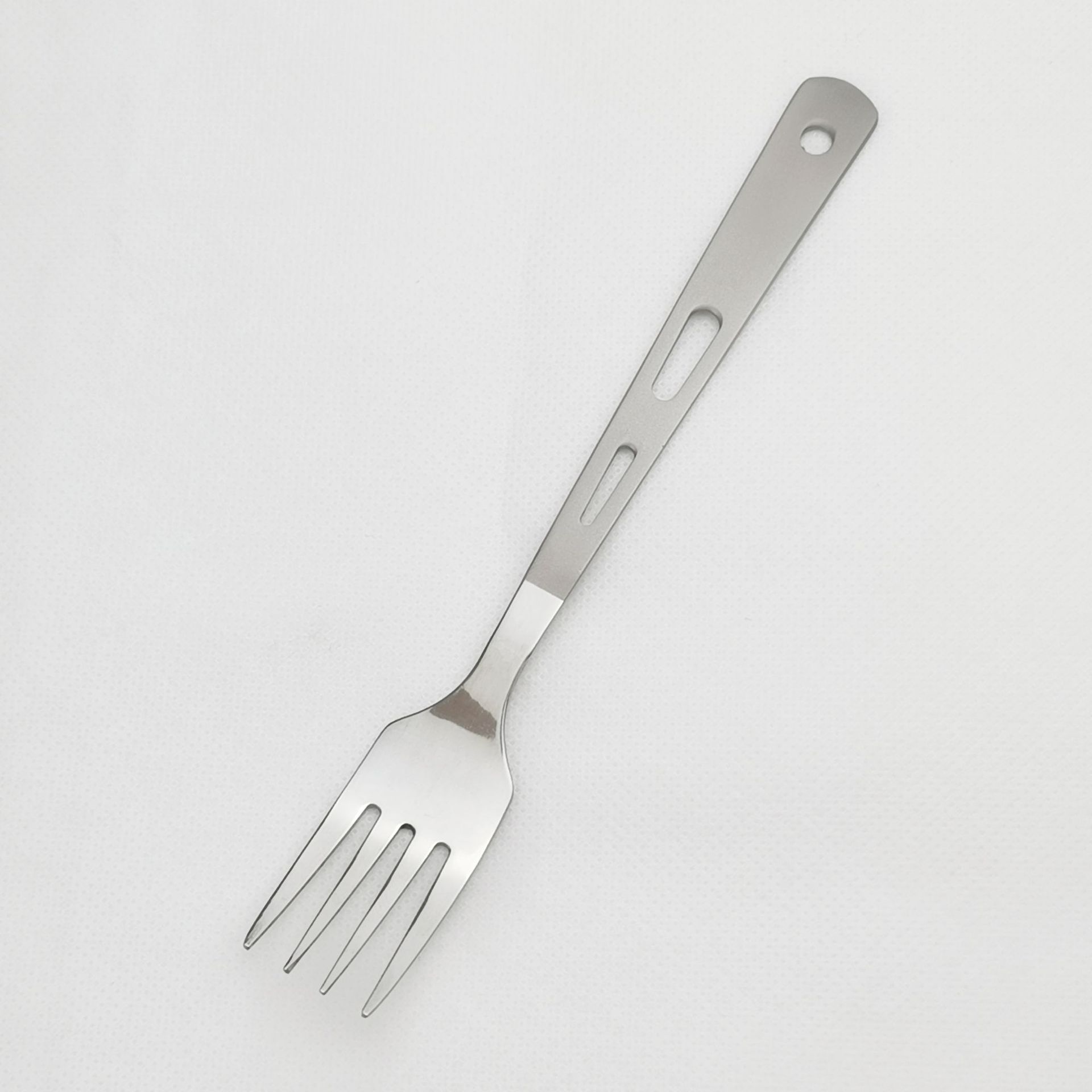 Tenedor exterior de titanio puro