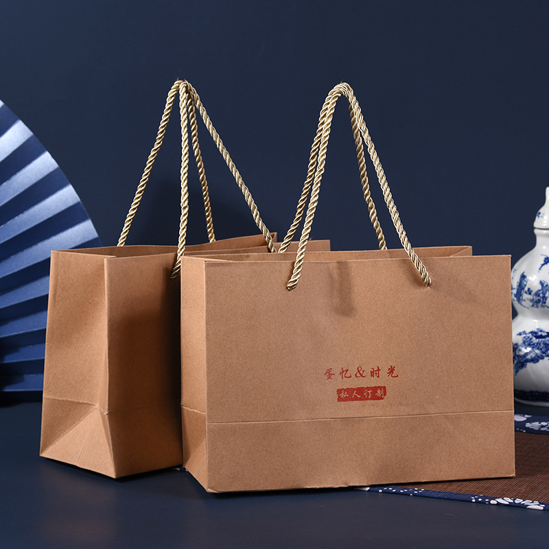 厂家供应通用手提纸袋 礼品购物纸袋 多种牛皮纸袋可印logo