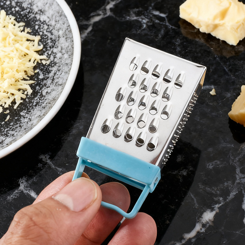 Fabricante mini planador de queso cuadrangular planador multifuncional de acero inoxidable jengibre planador de queso picador de verduras