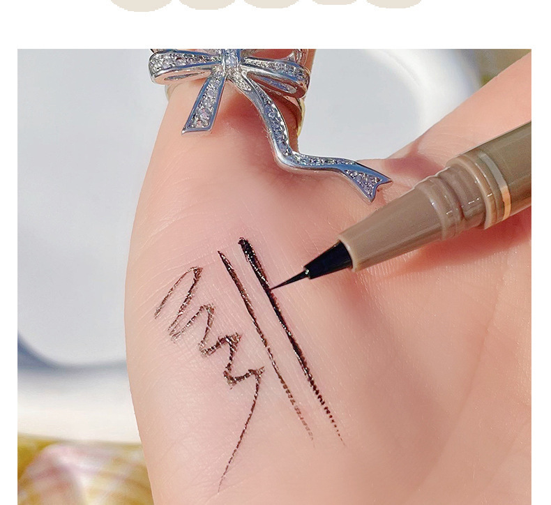 Wholesale of sweet mint Fine eyeliner Pen, waterproof, sweat-proof, long-lasting and non-staining brown liquid eyeliner pen undefined