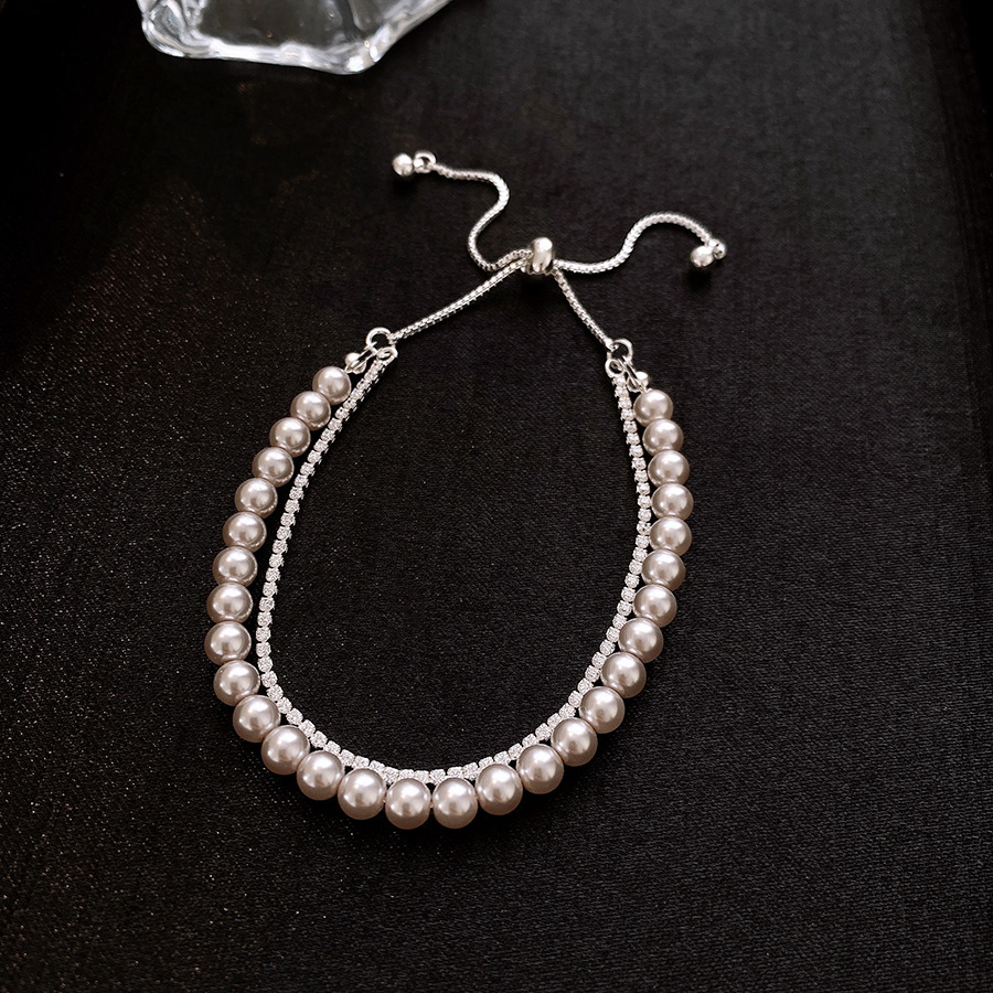 Pulsera de amor solar de circón galvanizado en oro real