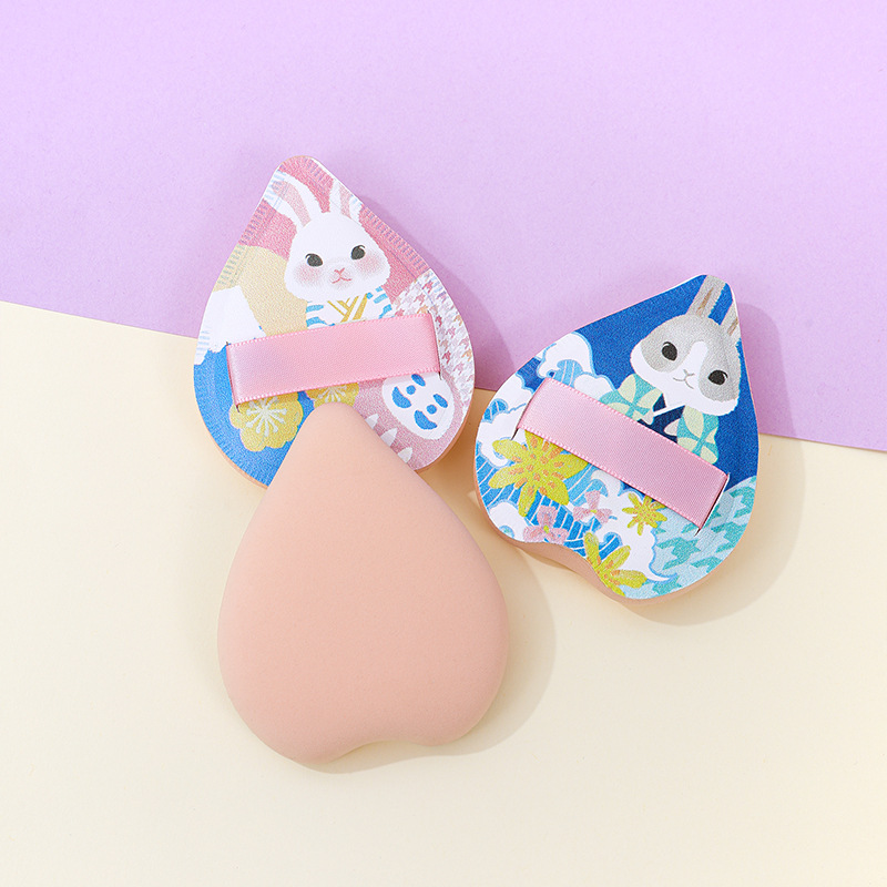 La fábrica personaliza la borla de algodón de azúcar de gran tamaño sin comer polvo, engrosamiento, amor, maquillaje en forma de corazón, esponja, cojín de aire, maquillaje, servicio gigante