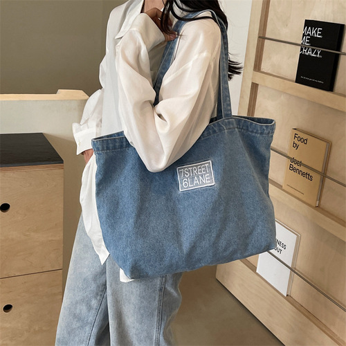 水洗牛仔布单肩包包女字母大容量通勤手提女包休闲学生上课书包