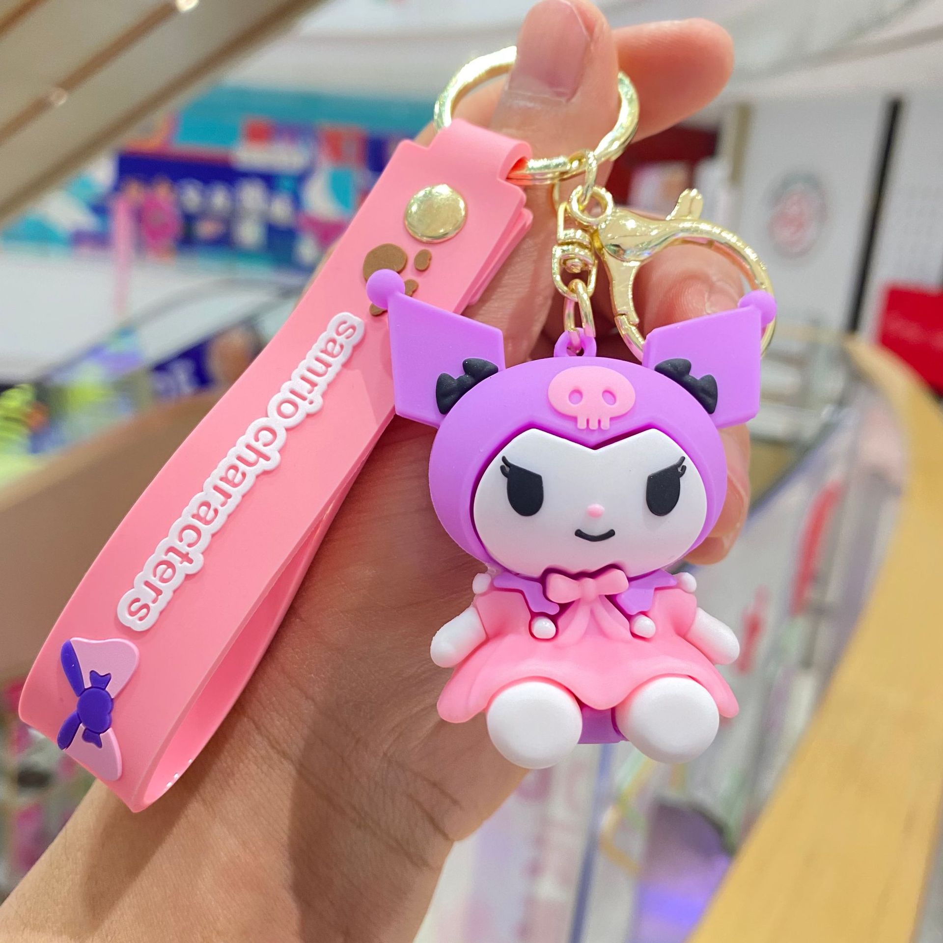 Nuevo Sanrio coolomi llavero niñas mochila colgante sentado belleza muñeca colgante llavero