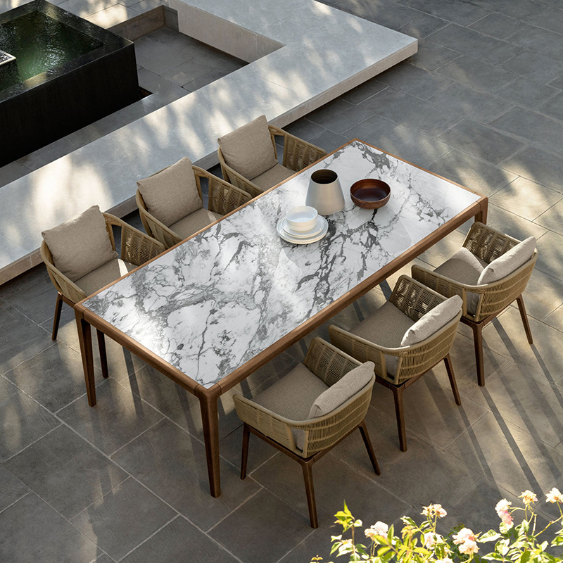Mesas y sillas de comedor de madera maciza de teca al aire libre Combinación de muebles de jardín de villa Casa de familia Silla de ratán de estilo de ocio nórdico al aire libre