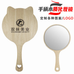 Ins風美容院の化粧鏡の取っ手の紋様は手を持って携帯して化粧の美容鏡の木製の鏡を持ちます。