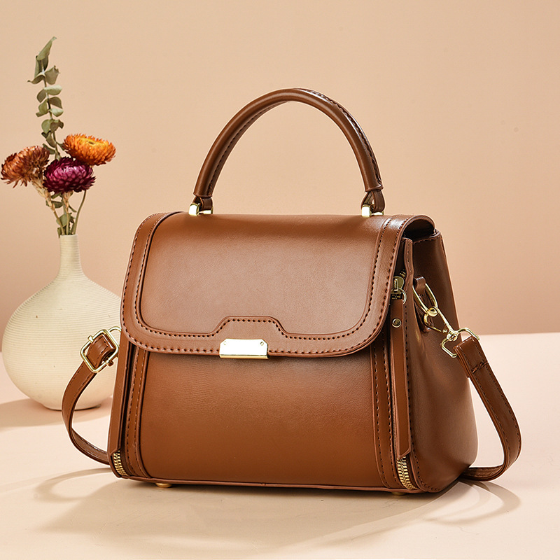 Bolso de mano bolso de comercio exterior de Taizhou bolso de mujer bolso de mensajero de un solo hombro de color sólido bolso de madre simple de moda de todo fósforo bags