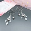 White pendant, small bell