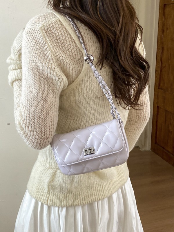 Bolso de cadena de diamante popular bolso de mujer 2026 nuevo estilo de alta calidad humedad moda de color sólido con cierre bolso de hombro